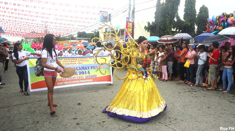 Sangyaw Festival Girl Holding Sto. Nino