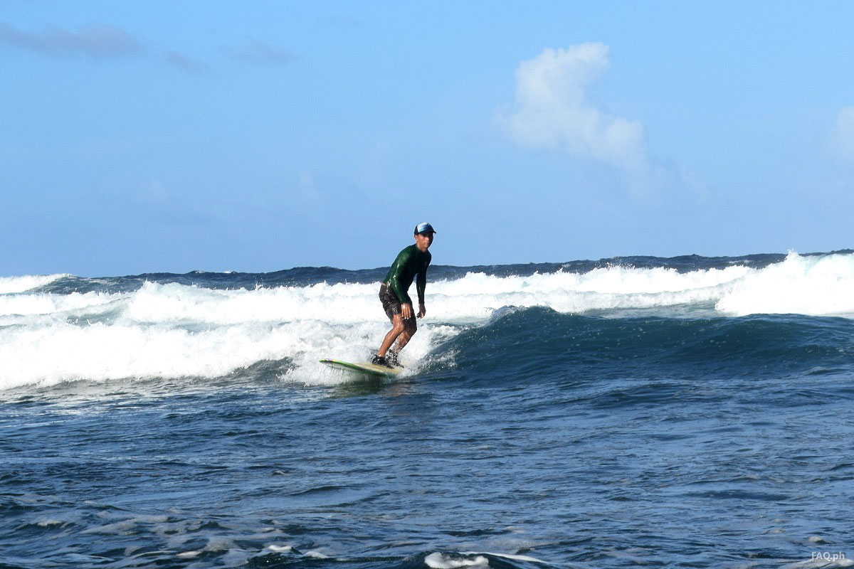 Surfer in ABCD Beach